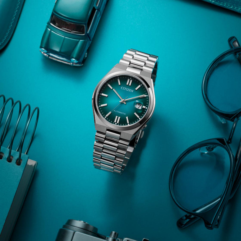CITIZEN NJ0151-88X AUTOMATIC - MODERN SILVER TIMEPIECE WITH TURQUOISE DIAL