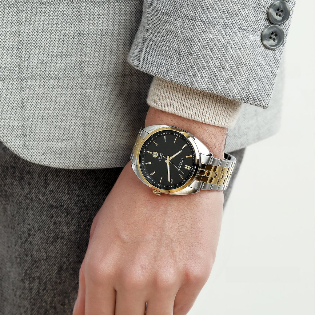CITIZEN BI5094-59E - ELEGANT POWERHOUSE: Men's Stylish Silver & Gold Watch with Bold Black Dial