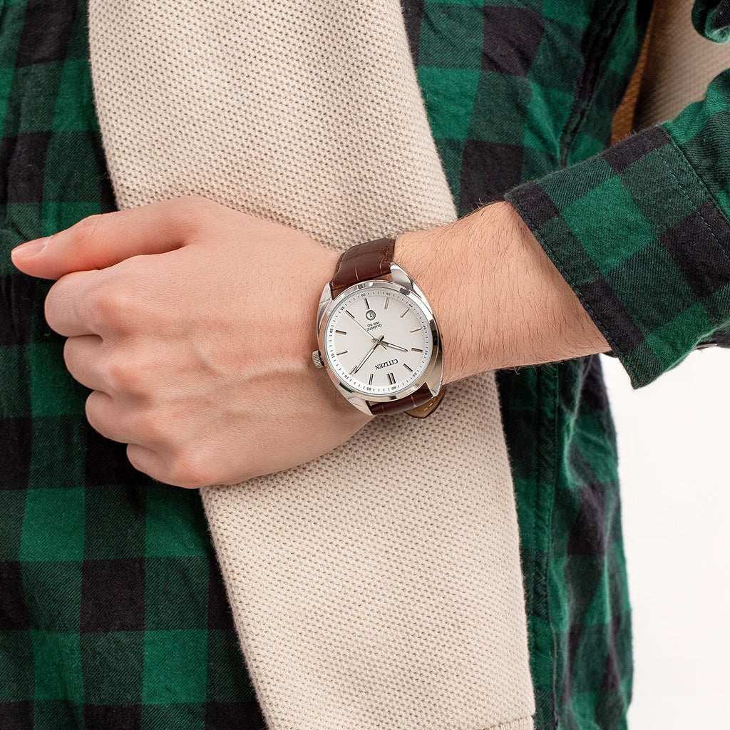 CITIZEN BI5090-09A - ELEGANT TIMEPIECE FOR MODERN MEN: SOPHISTICATED QUARTZ WITH LEATHER BAND