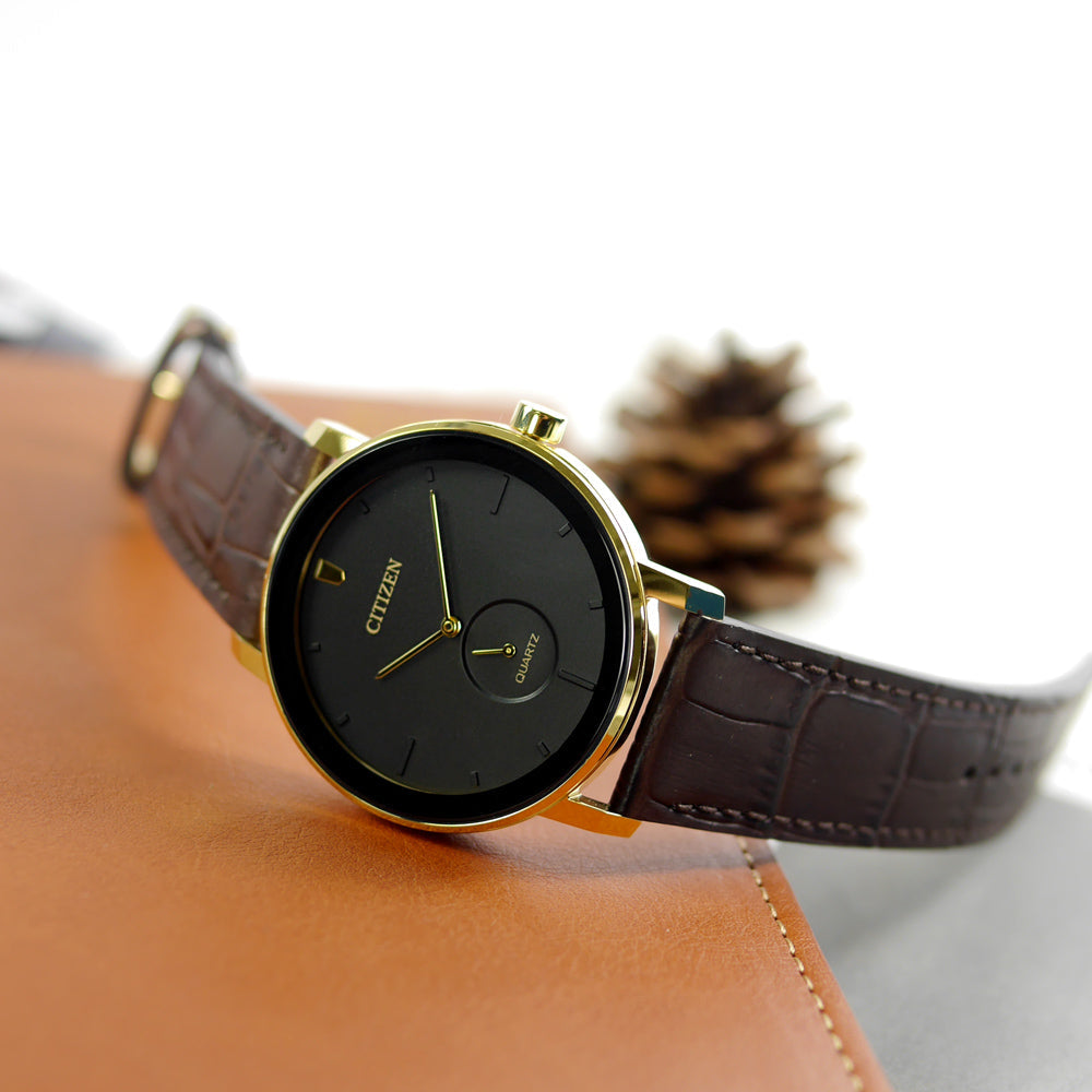 CITIZEN BE9182-06E - BOLDLY SOPHISTICATED MEN'S TIMEPIECE WITH GOLD & BLACK ELEGANCE