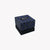 a black box with a blue pattern on it