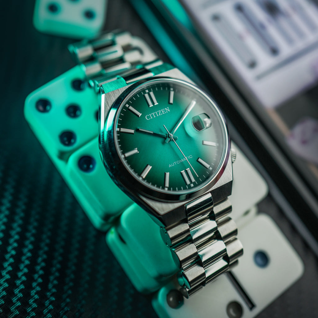 CITIZEN NJ0151-88X AUTOMATIC - MODERN SILVER TIMEPIECE WITH TURQUOISE DIAL