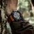 CASIO G-SHOCK GG-B100-1A9DR - ADVENTURER'S XTREME COMPANION Men's Watch with black/orange design, altimeter, and compass