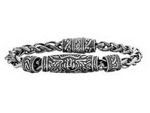 a silver bracelet with a design on it
